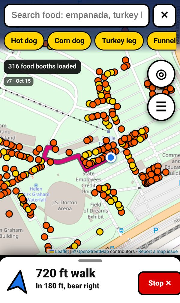 Fair Finder guiding to a booth: a pink walking route on the map, and a bar at the bottom showing an arrow, 720 ft walk, In 180 ft, bear right, and a Stop button